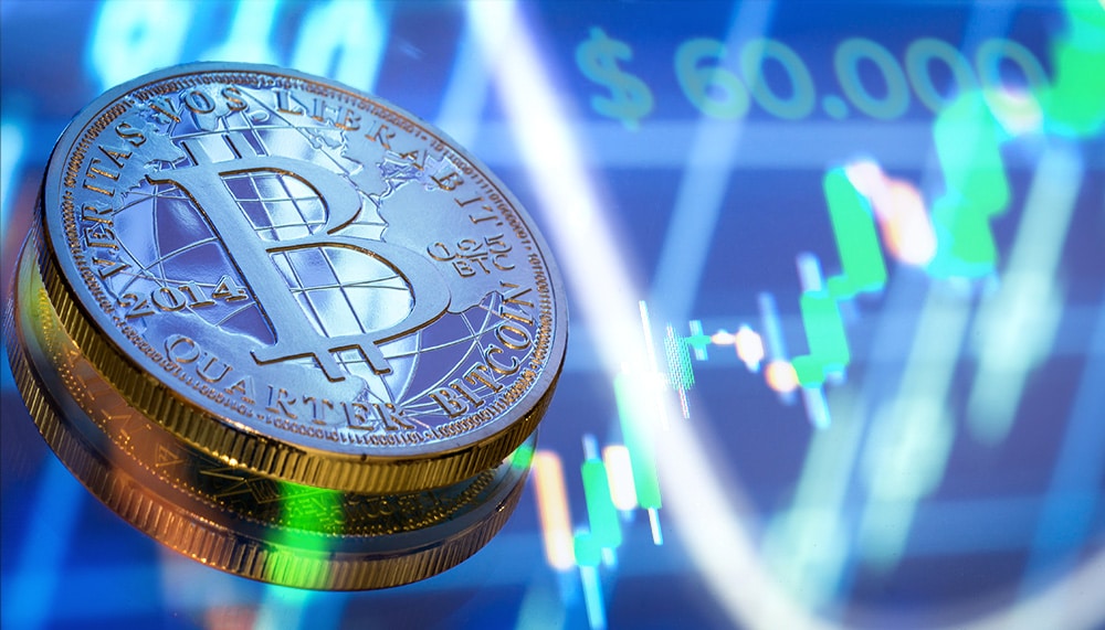 Precio de bitcoin se recupera y vuelve a apuntar hacia los 60.000 dólares