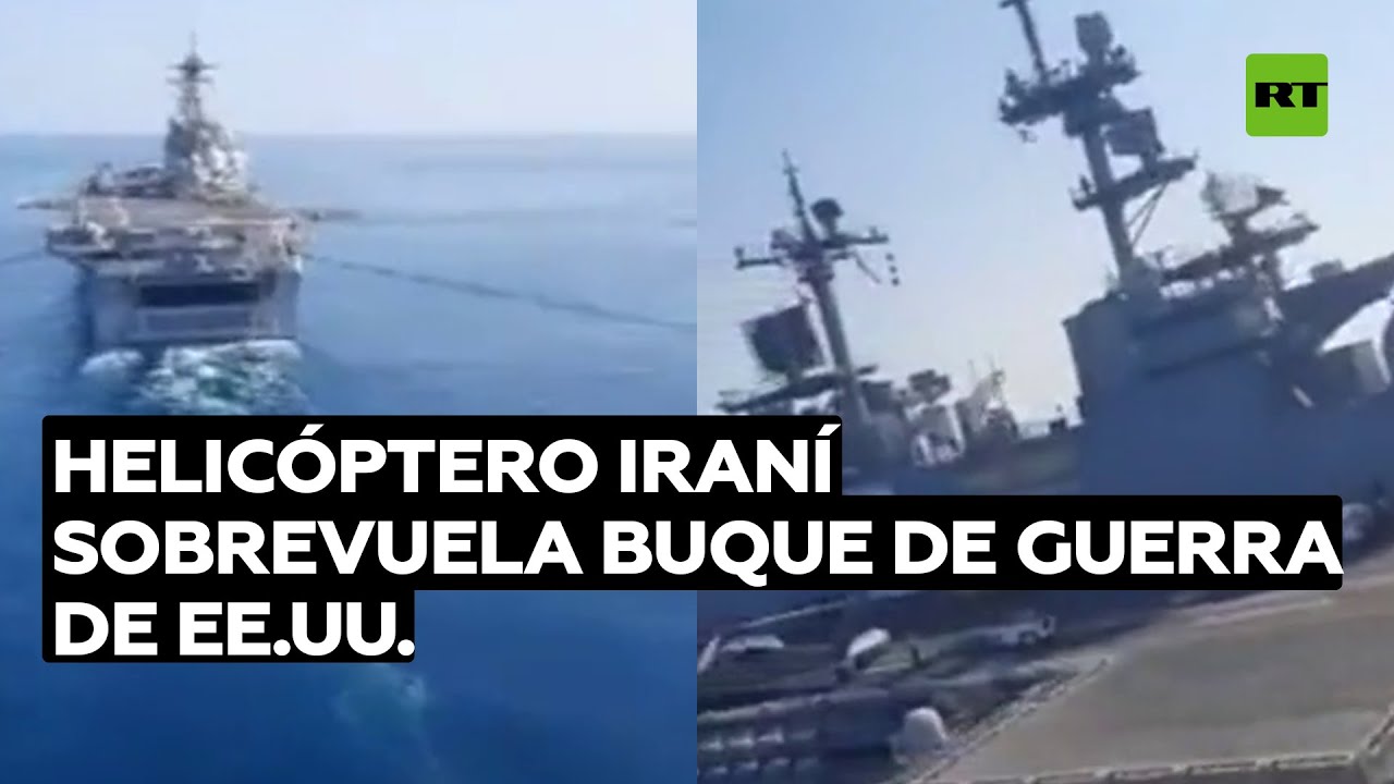 Un helicóptero iraní sobrevuela un buque de guerra de EE.UU. en aguas del golfo Pérsico