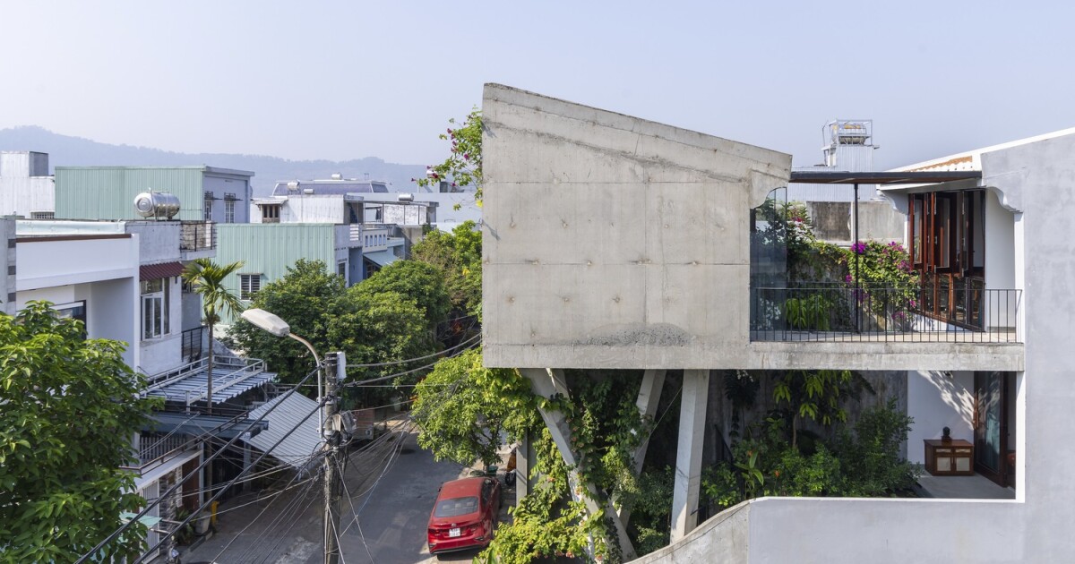 Nest House de varios pisos se cierne sobre la jungla urbana vietnamita