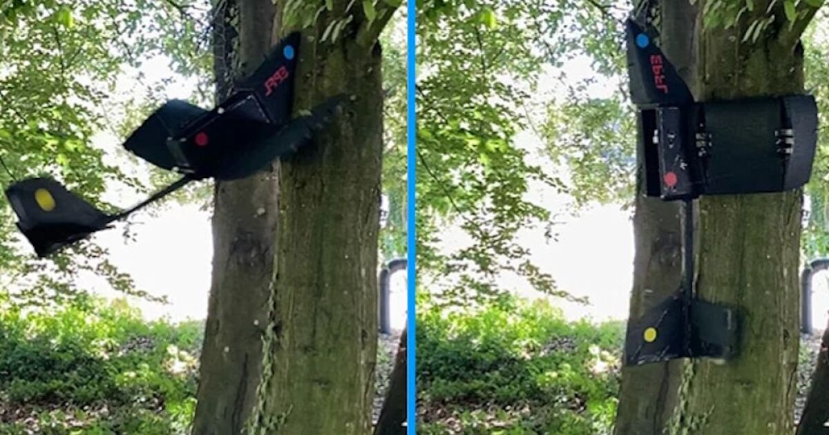 Un UAV de morro curvo se estrella contra los árboles y luego envuelve sus alas para posarse