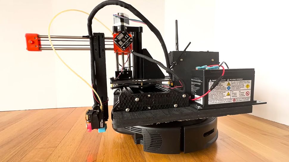 Alguien fusionó una impresora 3D y un robot aspirador para crear una impresora 3D móvil que puede imprimir en casi cualquier superficie plana, incluido el suelo.